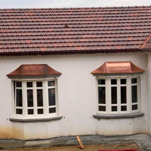 Vivienda con tejados de cobre
